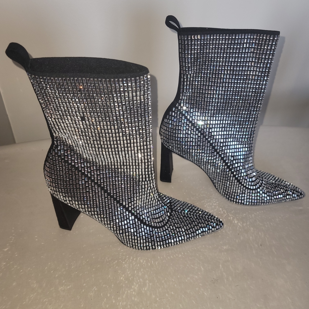 Wild Pair Shimmering Silver Heeled Boots